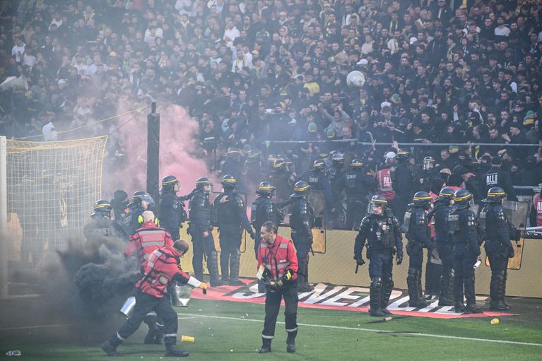 Security forces maintain control as Nantes supporters return to their section