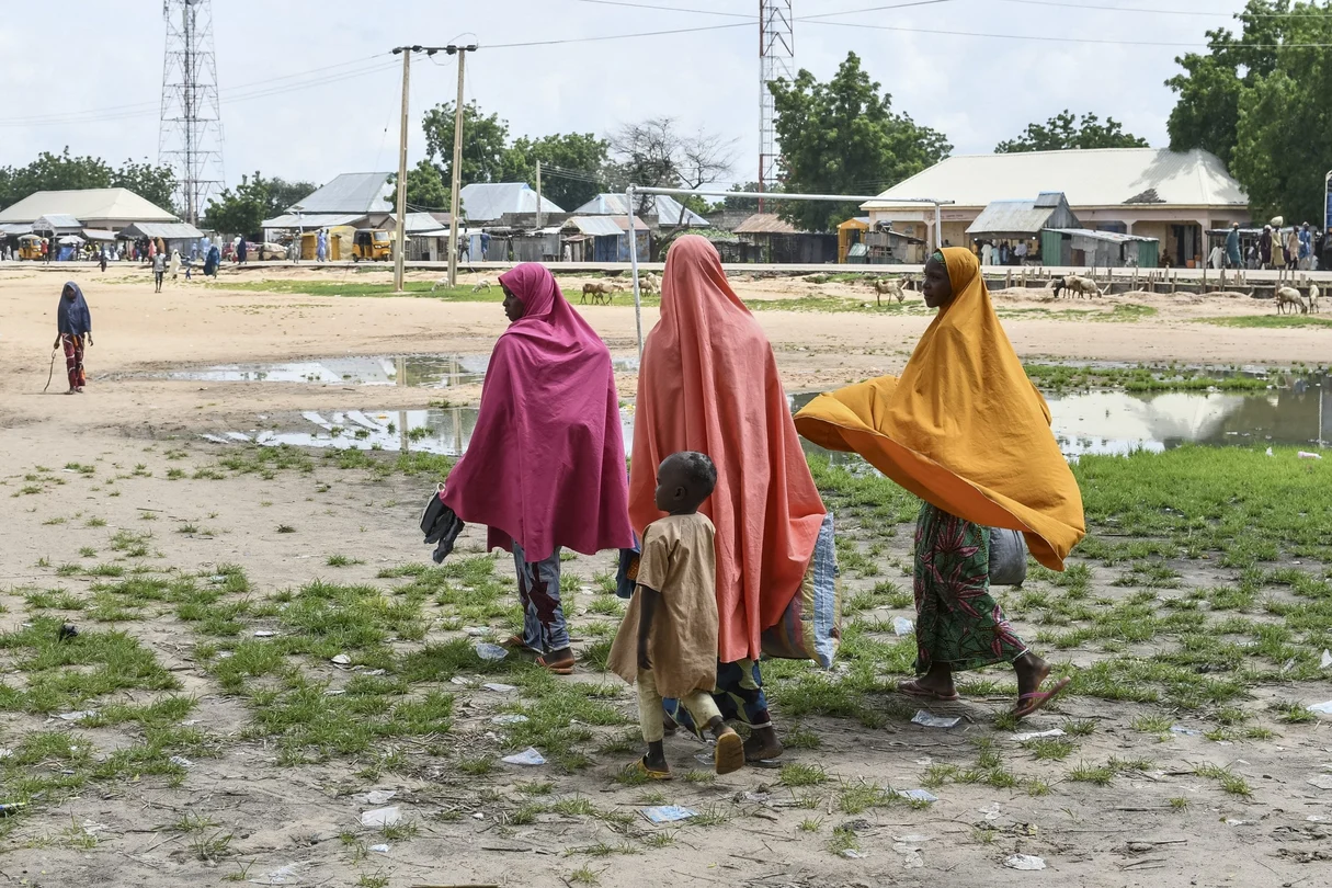 Survivors and relatives of victims gather in Babban Gide following a suspected Boko Haram attack. At least 81 lives were lost and multiple individuals remain missing after a brutal assault by suspected jihadists in Yobe State, northeastern Nigeria, local officials confirmed on September 3, 2024.
