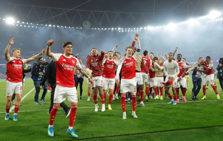 Arsenal players on the pitch during Champions League preparations
