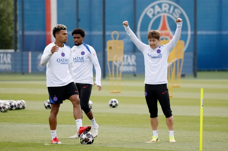 PSG players celebrating during a Champions League match