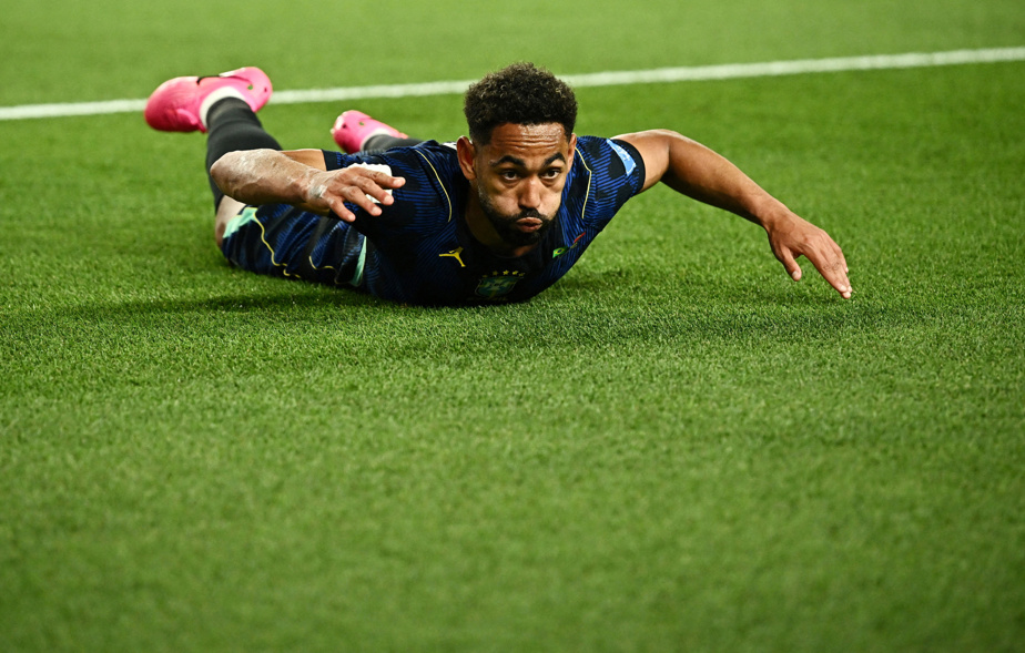 Matheus Cunha celebrating his goal for Brazil