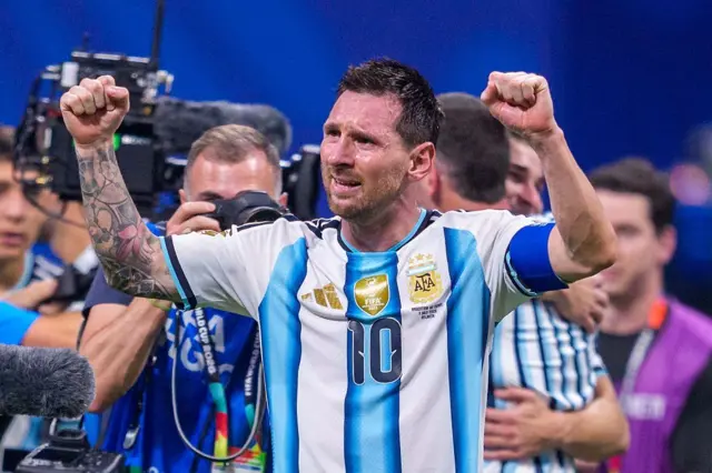 Argentine captain Lionel Messi celebrates after his team's victory over Egypt in the Round of 16 at Mercedes-Benz Stadium in Atlanta, Georgia
