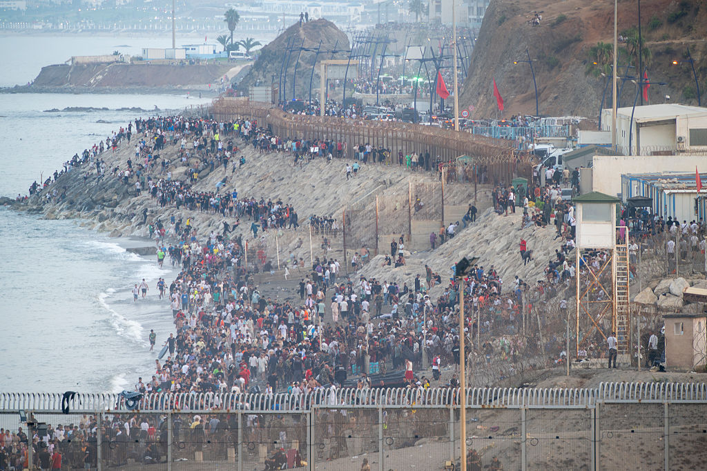 Moroccan flag waving near Spanish coast